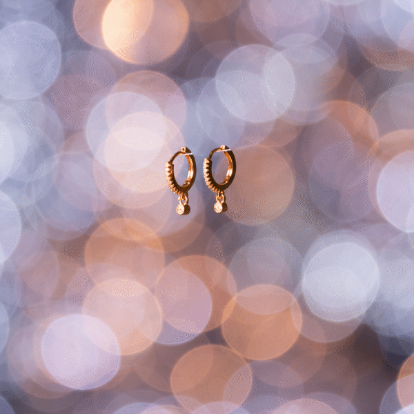 Elegant Rose Gold Toned Drop Hoop Earrings - Image 4